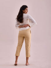 Load image into Gallery viewer, Go Colors Light Gold Poly Modal Cropped Metallic Pants
