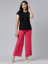 Load image into Gallery viewer, Go Colors Coral Viscose Stretch Knit Palazzo
