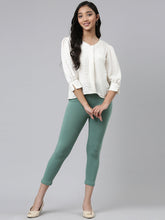 Load image into Gallery viewer, Go Colors Leaf Green Cotton Stretch  Cropped Leggings
