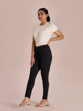 Load image into Gallery viewer, Go Colors Black Cotton Poly Stretch Stripes Printed Jeggings
