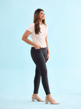 Load image into Gallery viewer, Go Colors Black Cotton Polyester Warm Printed Jeggings
