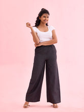 Load image into Gallery viewer, Go Colors Black Woven Lyocell Denim Palazzos
