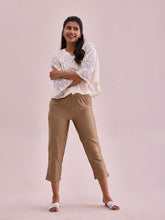 Load image into Gallery viewer, Go Colors Gold Poly Modal Cropped Metallic Pants
