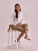 Load image into Gallery viewer, Go Colors Gold Poly Modal Cropped Metallic Pants
