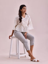 Load image into Gallery viewer, Go Colors Silver Poly Modal Cropped Metallic Pants
